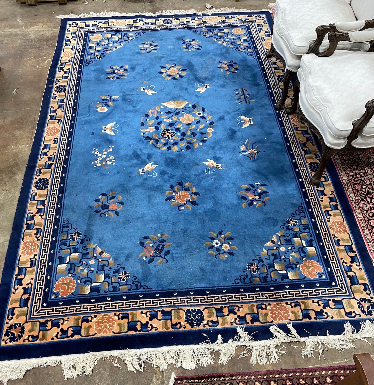 A Chinese blue ground carpet, 300 x 200cm